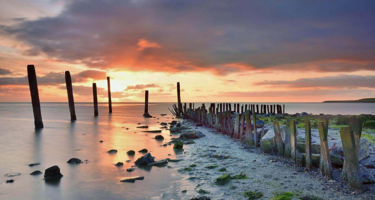 Zonsopgang en zicht op de Waddenzee bij De Cocksdorp