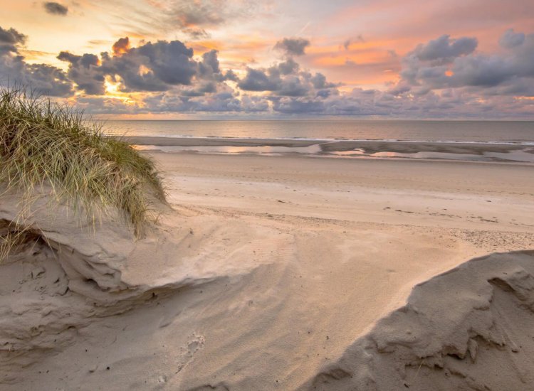 Sunset View on North Sea and Canal fom dunes in Zeeland, Netherlands