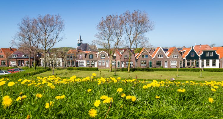 Panorama Village Oudeschild with Zeemans church and trraditional gable  houses on the Wadden island Texel in the Netherlands